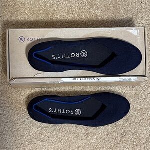 Rothy's Navy Solid Round Toe Flats